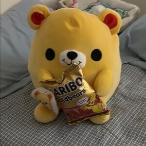 Yellow and Black Stuffed Bear Toy